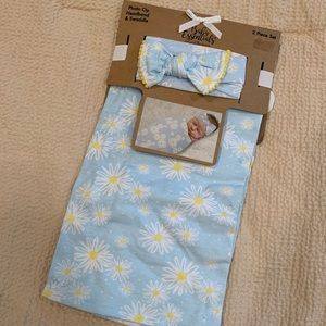 Baby swaddle and headband.